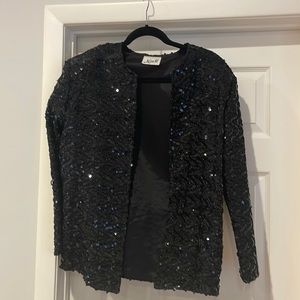 Black sequined evening jacket. Excellent condition from smoke free home